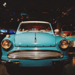 timeless-classic-cars-lined-up-on-a-scenic-road-with-vintage-style-polished-paint-and-iconic-designs